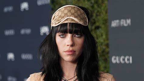 Billie Eilish finally reveals full massive back tattoo in topless photo